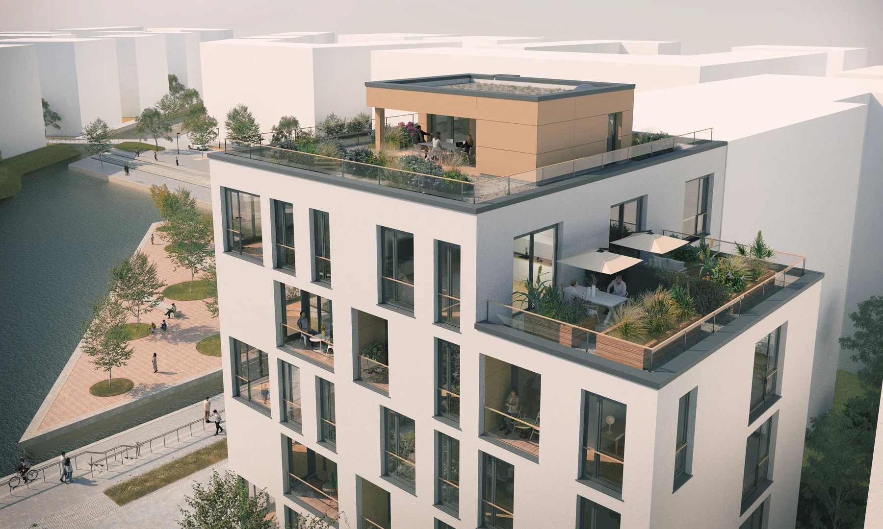 Wohngebäude mit moderner Architektur, großen Fensterflächen und Dachterrasse
