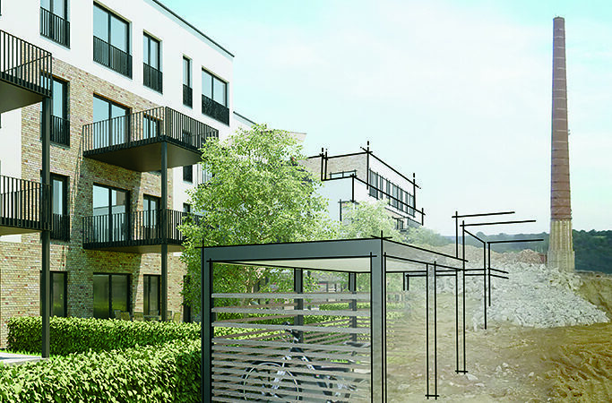 Baustelle mit Bauschutt und Schornstein neben modernem Wohngebäude mit Balkonen.